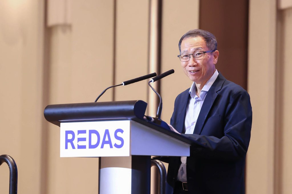 REDAS President Mr Tan Swee Yiow delivering his welcome address at REDAS Real Estate Market Outlook 2026