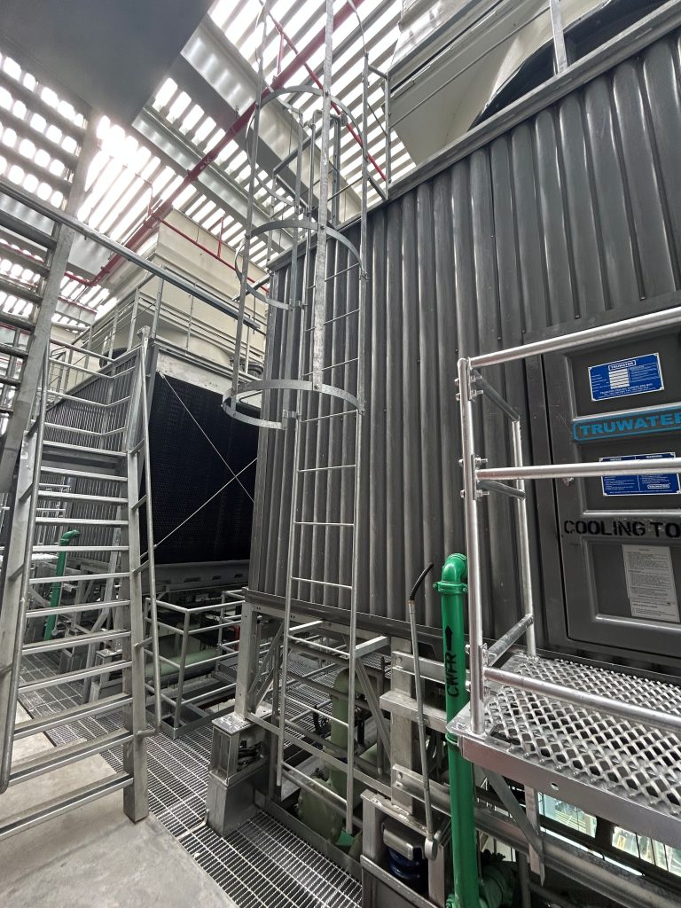 Cat Ladder with metal enclosure to access top of cooling tower